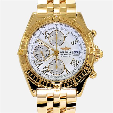 breitling 18k gold watch.